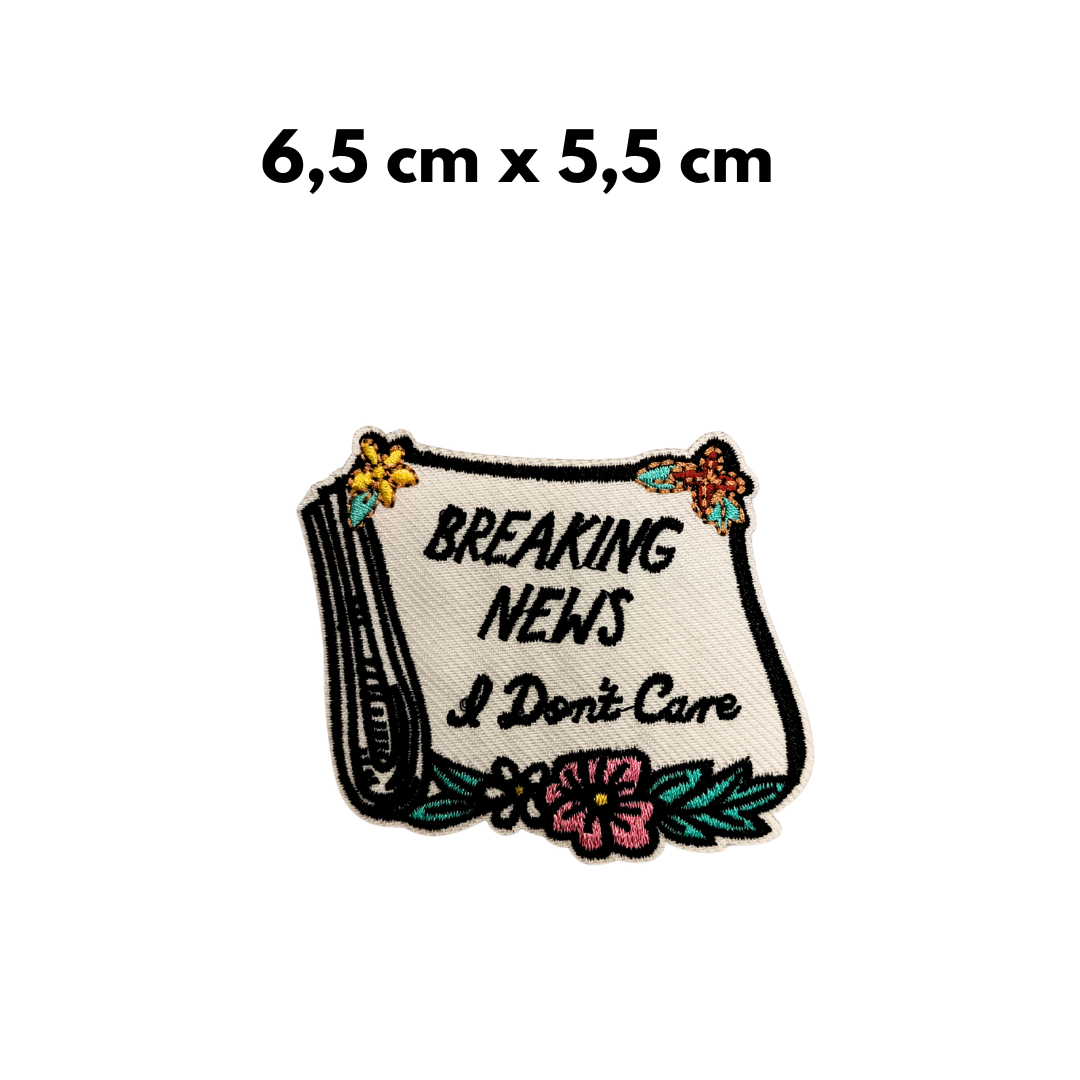 TOPPA RICAMATA TERMOADESIVA "BREAKING NEWS I don't care"