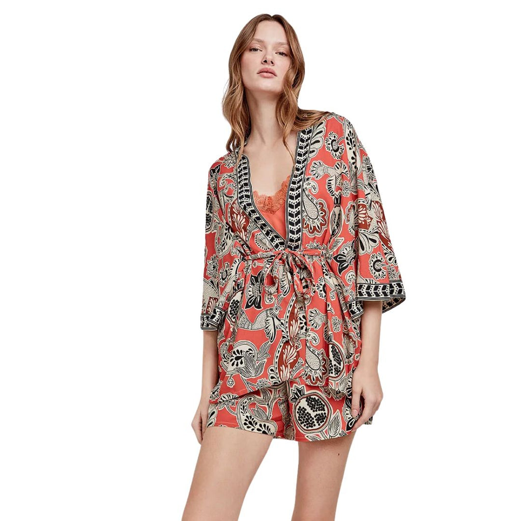 Kimono arancio ruggine con disegni  volatili fiori e melograno